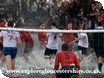Football in the River Windrush at Bourton on the Water