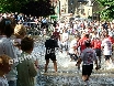 The crowds look on