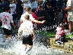 ... and celebrate, soaking the spectators...