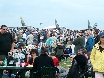 Crowds look on