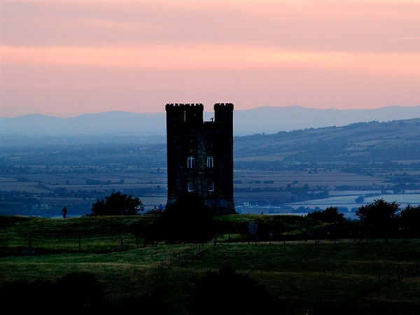 Sunset behind Broadway Tower & Country Park