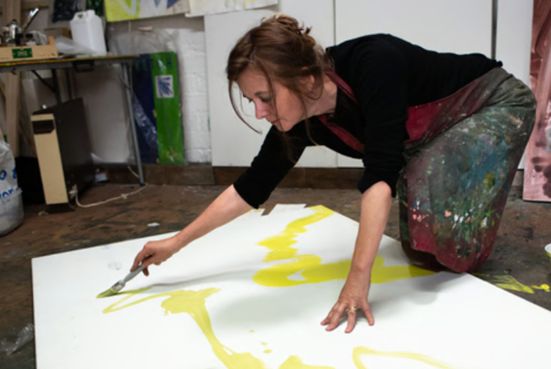 Fiona McIntyre creating artwork using natural earth pigments