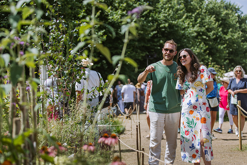 Visitors enjoying flowers at RHS Badminton Flower Show